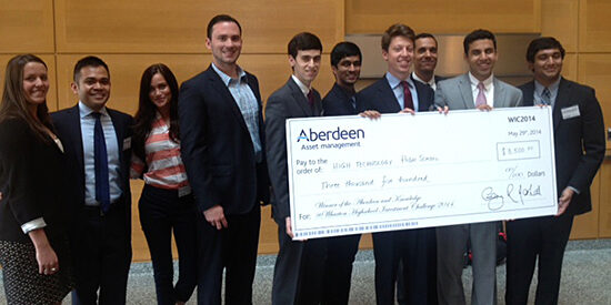The Aberdeen Asset Management team presents the winning $3,500 check to HTHS Investment Club from High Technology High School in Lincroft, N.J.