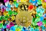 Gold Bitcoin coins surrounded by colorful, sparkling gemstones, symbolizing digital currency wealth and value.