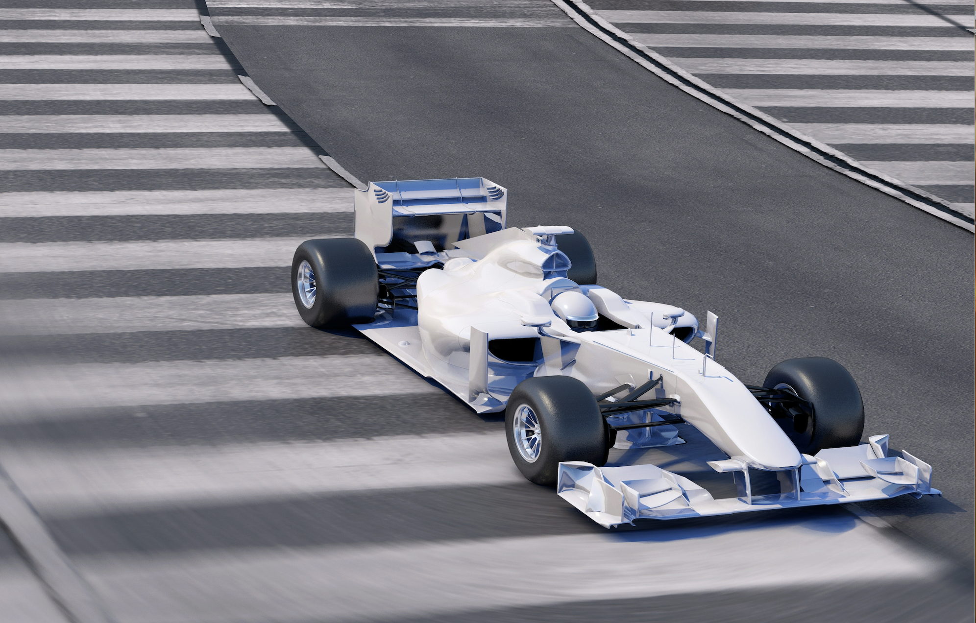 blue and white formula one motorsports car driving on paved track.